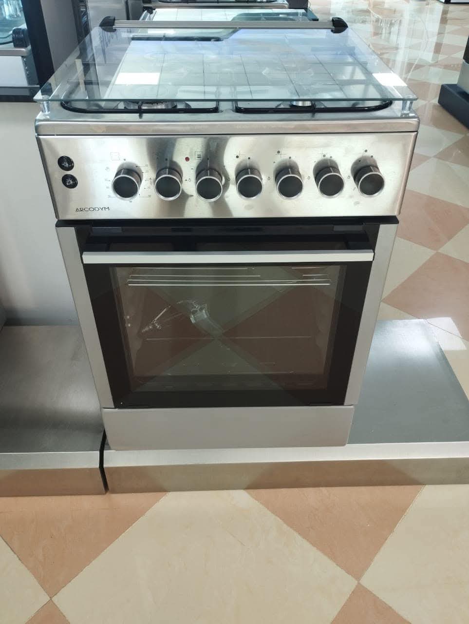Cuisinière ARCODYM KUMTEL 60 CM 4 FEUX VINT INOX CI60GG4FTN